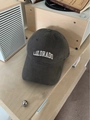 Detailed top-down view of dark grey cotton baseball cap with white Colorado embroidery - One Size / Gray