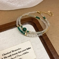 Elegant beaded bracelet set with malachite, clear crystal, and gold heart charm detail - 18K Real Gold Plated Crystal Natural Stone Bracelet