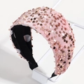 Detailed view of pink velvet headband with shimmering rose gold sequins and polka dot lining - Pink Rose Gold Sequin