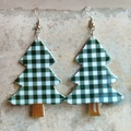 Detailed shot of Christmas tree earrings with green and white plaid pattern on acrylic - Green White Black Plaid Christmas Tree