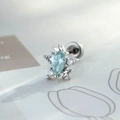 Orecchino a stella d'argento con zircone azzurro a goccia e piccoli cristalli lucidi - Celeste (Singolo)