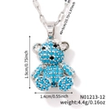 Charming silver teddy bear pendant necklace with sky blue pavé stones and O-chain link - Silver / Lake Blue Zirconia