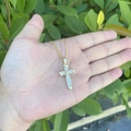 Macro shot of 18K gold-plated cross necklace with micro-pave zircons and heart tips - Heart Cross (2#)