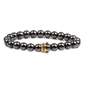 Detailed macro of hematite beaded bracelet featuring a gold crown charm on white background - Smooth Gold Small Crown