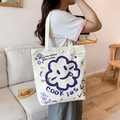 Off-white canvas tote bag featuring purple cartoon cloud smile pattern and text - Sunflower