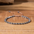 Adjustable hematite beaded bracelet with faceted grey stones on a wooden background - 25121101-Style 4 Dark Grey Faceted