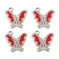 Macro detail of red butterfly alloy charms with sparkling rhinestones for DIY jewelry - White K - Red