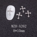 Macro detail of silver cross nail charm with zircon inlay on textured black surface - Silver Cross with Clear Stone (A262)