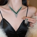 Silver V-shape zircon necklace and emerald tassel earring set worn by a model - Silver V-Shape (32#)