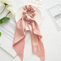 Pink satin long ribbon hair scrunchie with floral pattern on elegant white background - Pink