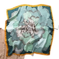 Elegant silk scarf featuring emerald floral patterns and a vibrant mustard yellow border - Green