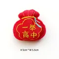 Detail of red plush sachet charm with gold embroidery and 5cm x 5.5cm dimensions - Academic Success / Adjustable