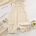 Beige sleeveless cotton baby bodysuit with ribbed knit texture and front snap buttons - 66CM / Off White
