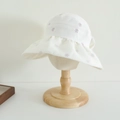 Detail of wide brim sun hat for girls with purple floral print and wavy ruffled edge - 52cm (3-6 Years) / White