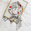 Artistic face print hair scarf in cream polyester, folded on a gold decorative frame - 7*100cm / Khaki Color Block Line Face