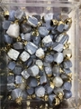 Blue and white lace agate pendants with gold metal caps stored in a clear box - Blue Chalcedony