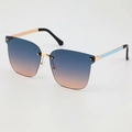 Occhiali da sole oversize senza montatura con lenti sfumate blu-arancio e stanghette d'oro - Tè Blu