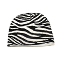 Detailed view of the soft knitted texture and black and white zebra print on the beanie hat - Zebra Print