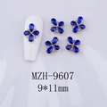 Detail of blue teardrop clover nail charms sized 9x11mm on white background - Royal Blue Gem - Gold Tone Base (MZH-9607)