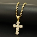 Collana con croce dorata e zirconi bianchi su catena a corda e supporto per gioielli nero - Oro
