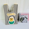 Knit tote bag with black and white stripes and yellow tulip flower pattern - Tulip Striped Black