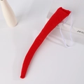 Detail view of red plush animal tail accessory with elastic cord for cosplay costumes - Bright Red Tail