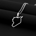 Macro shot of silver titanium steel Syrian map pendant with O-link chain on textured surface - Hollow Out / Steel
