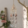 Golden pyramid crystal suncatcher with purple gemstones and rainbow light reflections - Purple Night Pyramid Suncatcher