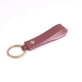 Pink PU leather keychain with gold metal ring and rivet detail on white background - Rouge & Gold (Single)