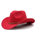 Close-up of red wool felt cowboy hat featuring a classic brown leather decorative band - Red