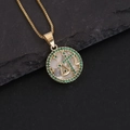 Macro shot of gold Libra zodiac necklace featuring white shell and green gems on dark rock - 7#Libra