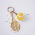 Miniature sports keychain featuring a gold tennis racket and fuzzy yellow ball pendant - 2.5cm Large Yellow Tennis Ball + Gold Racket