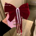 Burgundy velvet bow hair clip with sparkling rhinestone tassels and elegant pearl streamers - Red Velvet Rhinestone Tassel Bow Clip