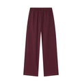 Detail of deep red wide-leg trousers with an elastic waistband and loose casual fit - S / Wine Red Pants