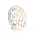 Oval cream jewelry display stand with faux pearl border holding earrings and necklaces - Large / Off-white Linen