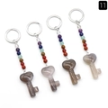 Key-shaped keychain with seven chakra beads and translucent heart pendant in grey tones - Grey Agate