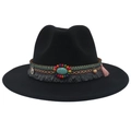 Detail of black felt fedora featuring colorful woven band, turquoise stone, and fringe - Black