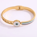 Gold titanium evil eye bangle featuring white enamel and crystal accents on a white base - Enamel White Eye Open Bangle