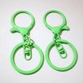 Detail of neon green painted lobster clasp and 8-shaped ring for DIY keychains - Green (Painted)