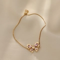 Adjustable golden butterfly bracelet with pink gemstone and box chain on silk fabric - Gold Pink Zircon Butterfly