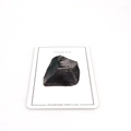 Detail of raw black obsidian ore specimen on a Thank You card for mineral collections - Obsidian