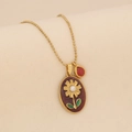Detail of vintage flower pendant necklace with gold daisy relief and red enamel - Burgundy