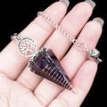 Orgone tree of life pendulum with purple crystal gravel and copper coil in resin - Blue Goldstone (Synthetic)