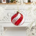 Red and white spiral 7.7cm Christmas ball ornament hanging on tree with golden string - Red and White Spiral Glass Ball
