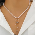 Baroque pearl necklace featuring a gold lotus pendant with zircon and metal tassels - Double Layer Lotus Style (02 KC Gold)