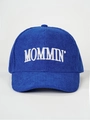 Close-up of MOMMIN' white embroidery on navy blue corduroy fabric of a baseball cap - Adjustable / Royal Blue