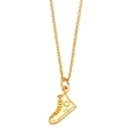 Golden high-top sneaker pendant necklace on a delicate metal chain over white background - Shoe