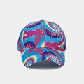 Close-up of rainbow tie-dye pattern on a six-panel curved brim baseball cap - Blue Purple Pink Cyan Tie-Dye (Color #6)