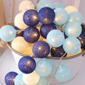 LED cotton ball string lights in dark blue, light blue, and cream white decor - Blue Ocean