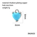 Detailed macro view of 18K rhodium plated heart pendant with blue zircon stone inlay - Silver/Light Blue Zirconia